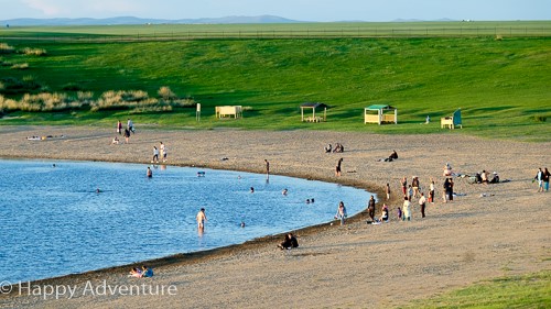 People around and in the lake