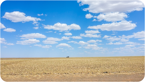 Summer scene with jeep on foreground